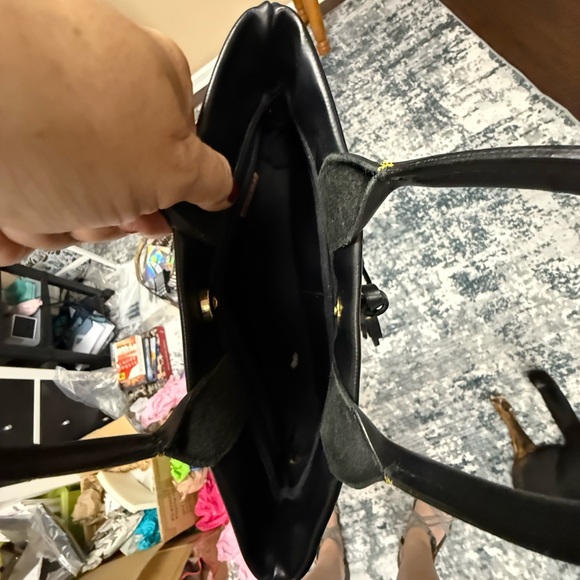 Dooney & Bourke Small Black Leather Handbag with Gold Accents